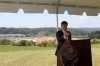 Matt Erskine speaking under tent