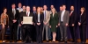 The Department of Commerce’s Energy Savings Contract Team, winner of the Lean, Clean and Green award category, pose for a photo with Ellen Herbst and Lisa Casias