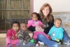 Laura Lane with Swazi children at the Heart of Africa orphanage