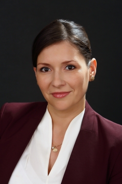 Andrea Pacheco Dhamer is Deputy Director for the Office of Business Liaison