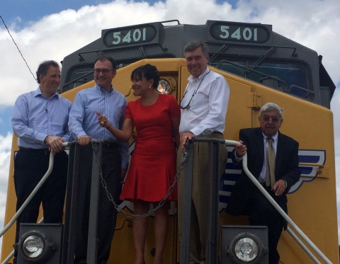 Secretary of Commerce Penny Pritzker joined U.S. and Mexican government leaders in Brownsville, Texas on the front of a locomotion engine