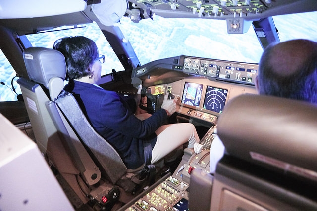 At the Flight Standards Training Center, the Secretary utilized the company’s Boeing 777 flight simulator to experience first-hand what it’s like to pilot one of the jumbo jets. 