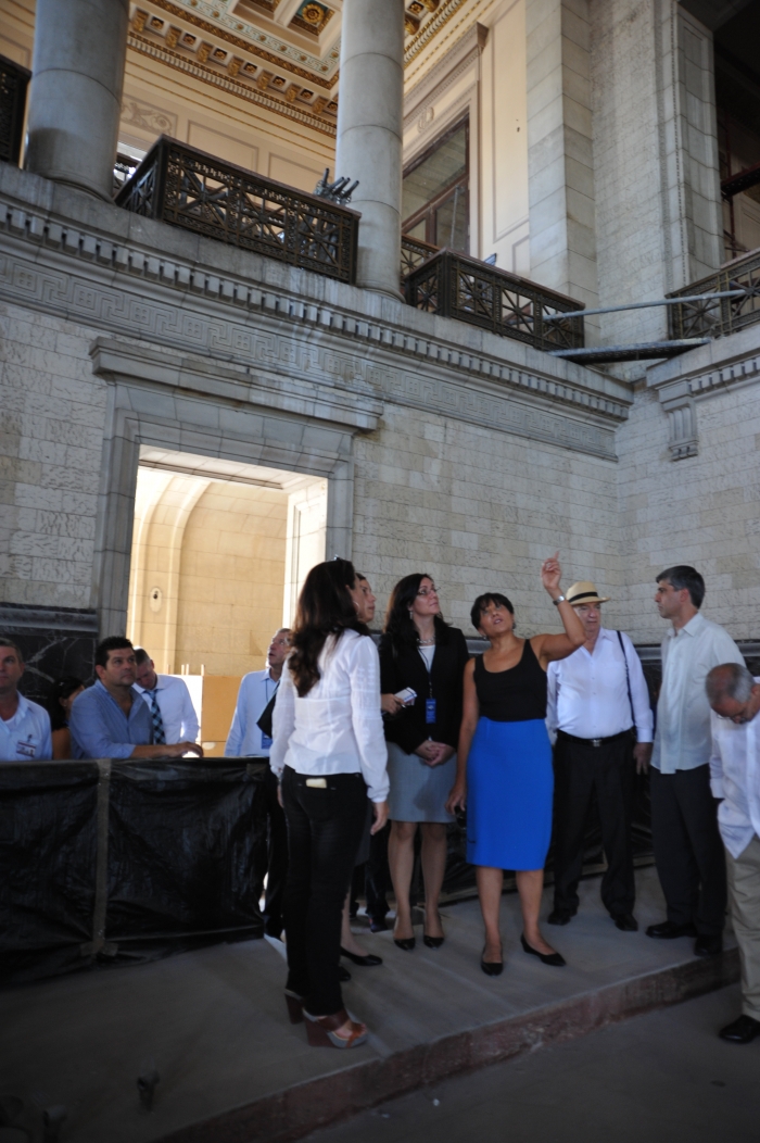 Secretary Pritzker (center) tours El Capitolio restoration in Cuba