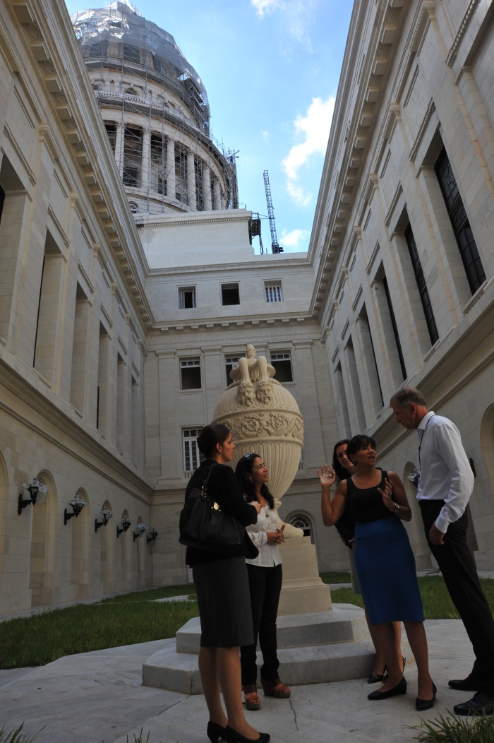 Secretary Pritzker (second from left) tours El Capitolio restoration in Cuba