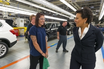 Secretary Pritzker speaks with workeres while touring the BMW facilities in Spartanburg, South Carolina