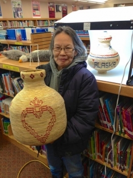 Chevak village elder displays her native artwork for sale online