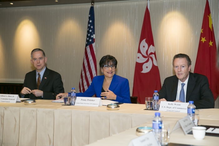 Consul General Hart (left), Secretary Pritzker (center), and General Counsel Welsh (right) meet with business leaders in Hong Kong