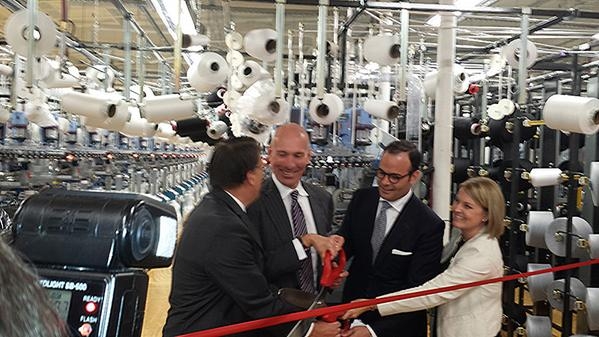 Under Secretary Stefan Selig (second from left) participates in a ribbon cutting ceremony with North Carolina Governor Pat McCrory (left) PEDS Legwear President and CEO Michael Penner and Walmart Vice President of U.S. Manufacturing Cindi Marsiglio.