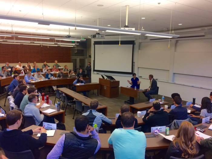 Commerce Secretary Penny Pritzker talks with students in the graduate-level Practical Policy and Politics class at Stanford University.