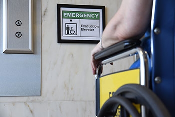 A new NIST study—with findings based on the concerns, insights and opinions of people with mobility impairments voiced during interviews—provides guidance for helping them get safely out of multistory buildings during emergencies, including the use of spe A new NIST study—with findings based on the concerns, insights and opinions of people with mobility impairments voiced during interviews—provides guidance for helping them get safely out of multistory buildings during emergencies, including the use of spe