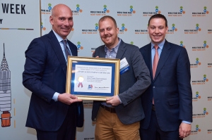 The 2016 World Trade Week Awards Breakfast, Under Secretary for International Trade Stefan Selig with Bob Frank of Bob Frank Entertainment and Trade Specialist Peter Sexton.