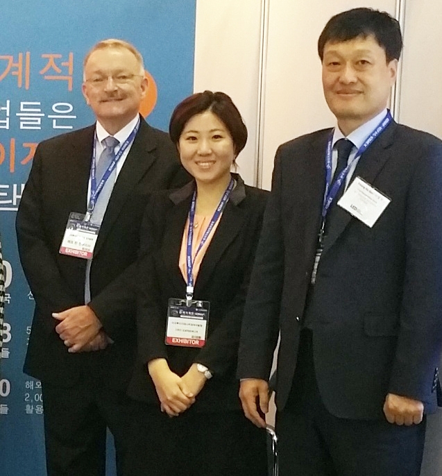 LED FastStart Executive Director Jeff Lynn and LED Korea's Eun Mee Ko and Young Ho Seo at KOMAF 2015 in Seoul.