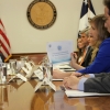Helen Greiner, CEO of CyPhy Works, Inc, holds up a handout during the  first-ever meeting of the Presidential Ambassadors for Global Entrepreneurship (PAGE) initiative