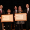 The OGC team holding their award aside Deputy Secretary Bruce Andrews.