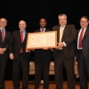 The NTIA team holding their award aside Deputy Secretary Andrews. The NTIA team holding their award aside Deputy Secretary Andrews.
