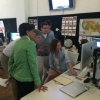 Secretary Pritzker and Steve Case viewing a demonstration at RoadTrippers