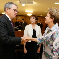 Deputy Secretary Andrews greets Brazilian President Dilma Rouseff during a visit on June 18, 2015