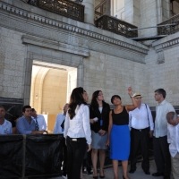 Secretary Pritzker (center) tours El Capitolio restoration in Cuba