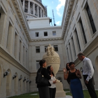 Secretary Pritzker (second from left) tours El Capitolio restoration in Cuba