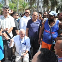 Secretary Pritzker (left) speaks with Cuban citizens in the plaza