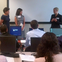 Secretary Prizker with students in classrom