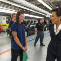 Secretary Pritzker speaks with workeres while touring the BMW facilities in Spartanburg, South Carolina