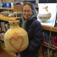 Chevak village elder displays her native artwork for sale online