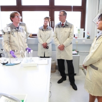 Secretary Pritzker tours a training facility at Bayer Health Care in Berlin, where she also participated in a Workforce Development Roundtable.