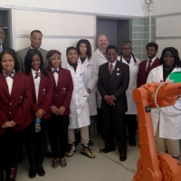 Assistant Secretary Jay Williams tours robotics lab with Detroit public school students at the Cody Academy of Public Leadership. Detroit was an early adopter of the My Brother&#039;s Keeper initiative.