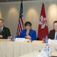 Consul General Hart (left), Secretary Pritzker (center), and General Counsel Welsh (right) meet with business leaders in Hong Kong