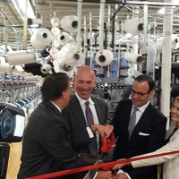 Under Secretary Stefan Selig (second from left) participates in a ribbon cutting ceremony with North Carolina Governor Pat McCrory (left) PEDS Legwear President and CEO Michael Penner and Walmart Vice President of U.S. Manufacturing Cindi Marsiglio.