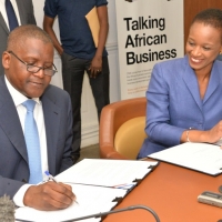 Enoh T. Ebong, Deputy Director, U.S. Trade and Development Agency Pictured at Signing Ceremony