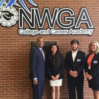 EDA Assistant Secretary Jay Williams with manufacturing students from NWGA College and Career Academy in Dalton, Georgia.