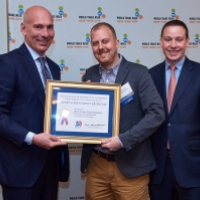 The 2016 World Trade Week Awards Breakfast, Under Secretary for International Trade Stefan Selig with Bob Frank of Bob Frank Entertainment and Trade Specialist Peter Sexton.