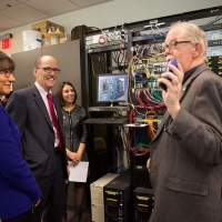 Secretary of Labor Tom Perez and Secretary of Commerce Penny Pritzker tour the cyber security training center at Montgomery College in Maryland on Dec. 10, 2014. 