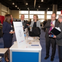 Secretary Perez visits the Department of Labor&#039;s &quot;Apprenticeship USA&quot; booth in the U.S. Government Pavilion at the 2015 SelectUSA Investment Summit 