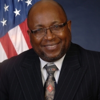 Dr. Willie E. May