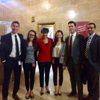 Secretary Pritzker greets Commerce employees on their way into work