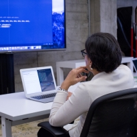 Secretary Pritzker explores Commerce data in a coding course at Galvanize