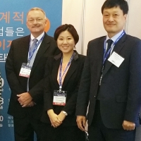 LED FastStart Executive Director Jeff Lynn and LED Korea&#039;s Eun Mee Ko and Young Ho Seo at KOMAF 2015 in Seoul.