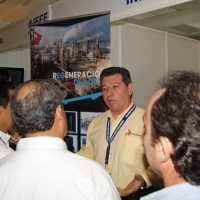 Octavio Manzano in IEEE Acapulco Mexico Show 2014, Talking to the CFE attendants about Oil Transformer Reclaiming